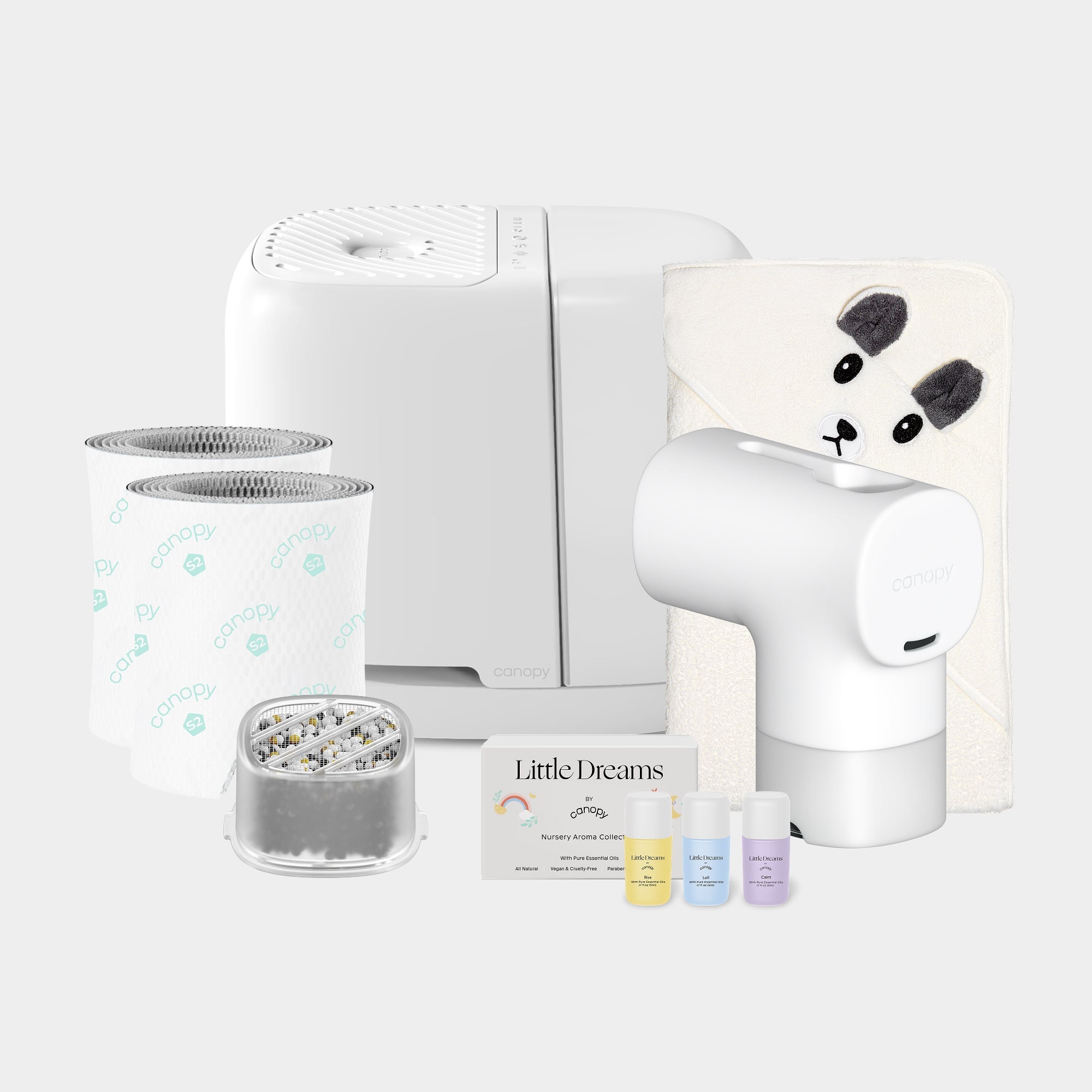 Canopy Baby Care Bundle White package showing a Nursery humidifier, bath tub filter and included accessories