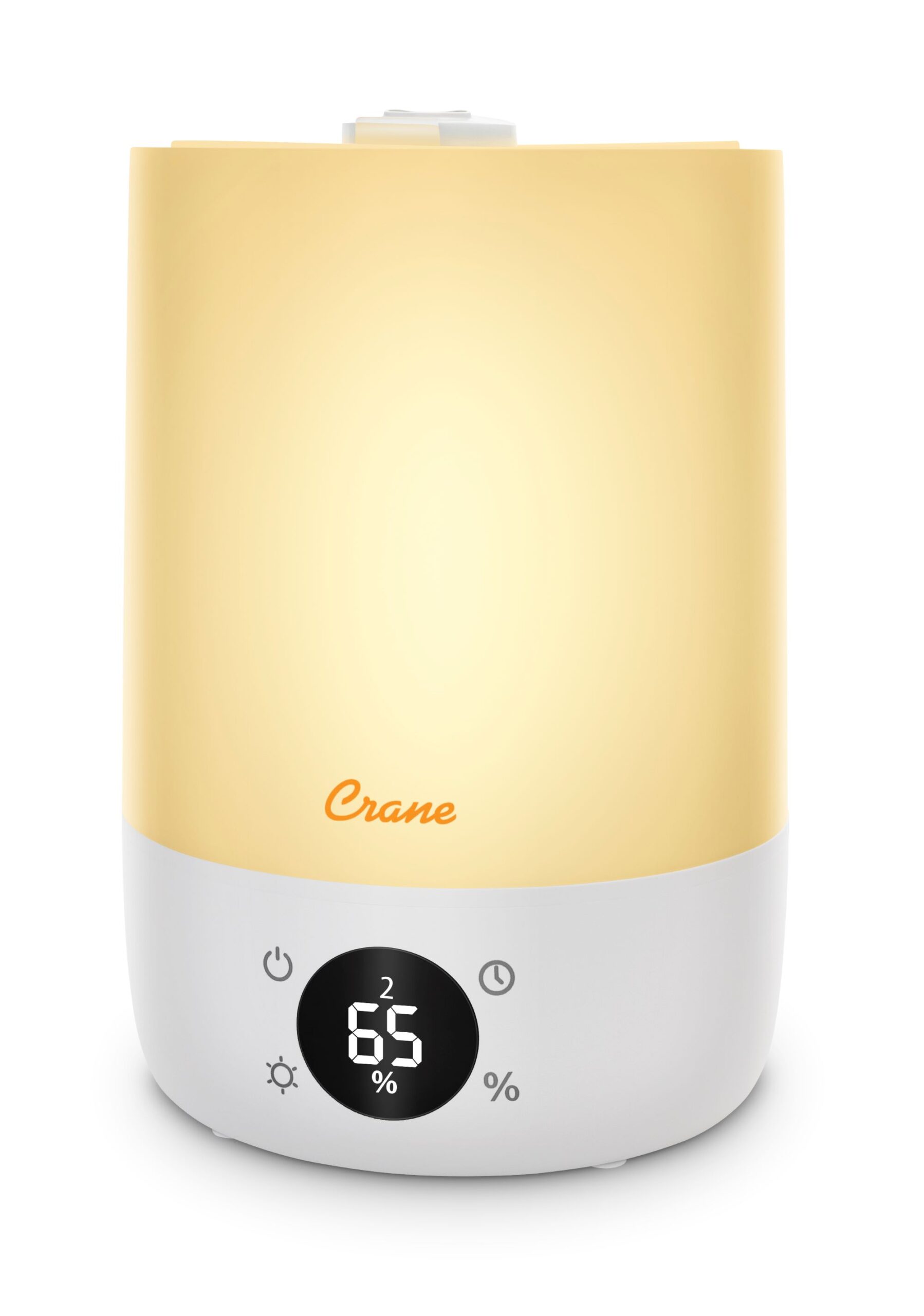 Full-unit view of the Crane EE-9095 humidifier, translucent pale-gold tank and white base with a humidity display.