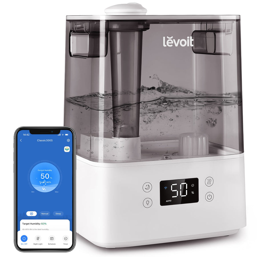 White Levoit Classic 300S humidifier with tank, on-device humidity display and a phone showing VeSync controls