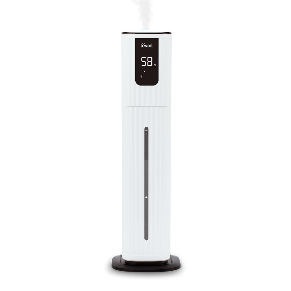 White Levoit OasisMist 1000S ultrasonic cool-mist tower humidifier with front humidity display, tank level window and wide dark base