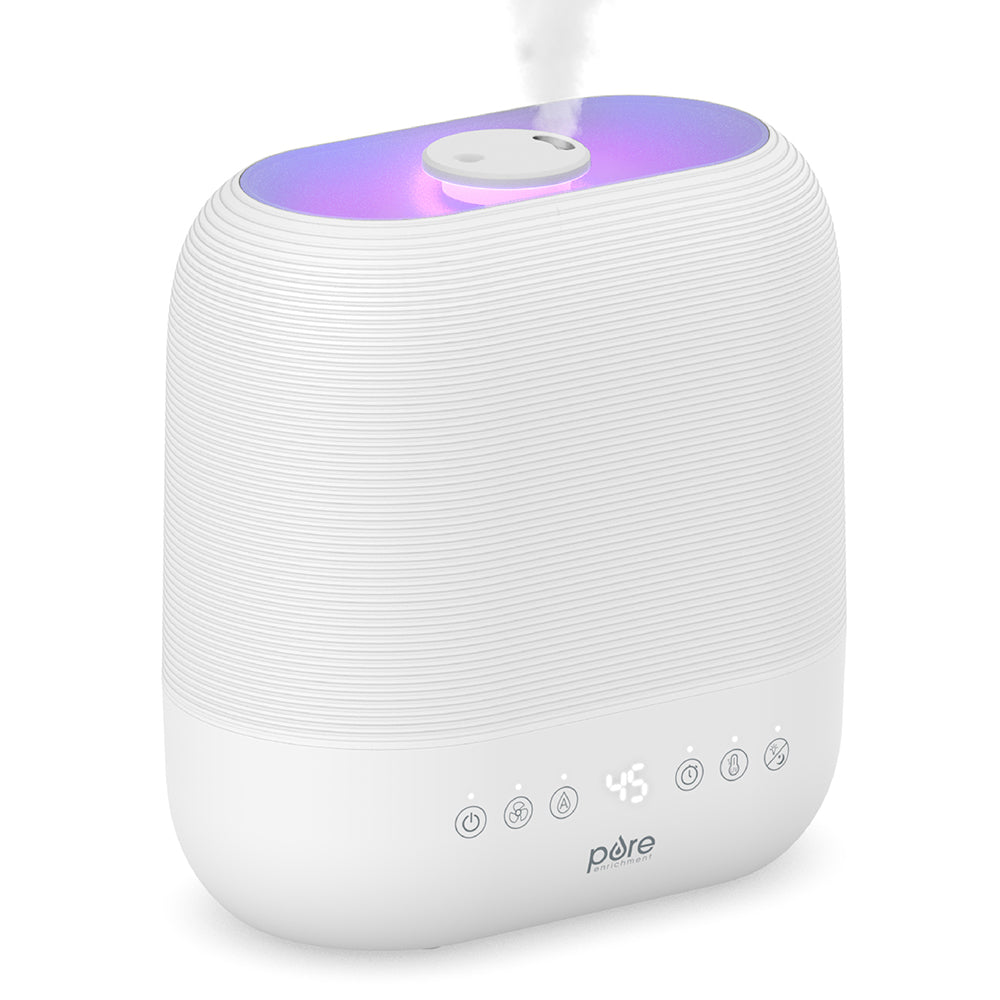 White HUME Sense 2-gallon humidifier with a purple-lit top, front humidity display and touch controls.