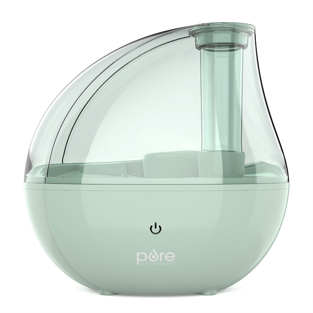 Humidificateur à ultrasons PureBaby PEHUMGRY-WG Whisper Green avec réservoir translucide, base blanc-vert et commande d’alimentation à l’avant.