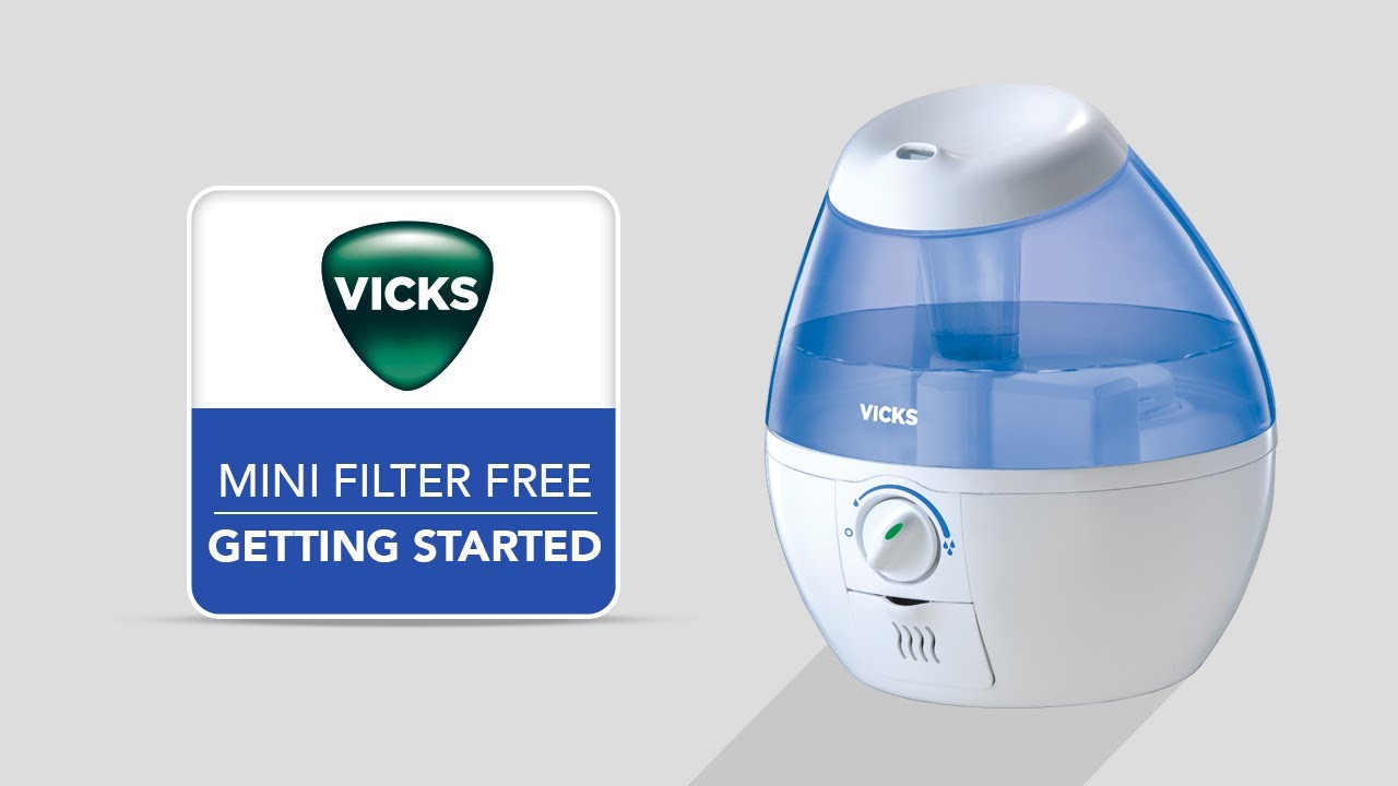 Humidificateur à brume froide Mini Filter Free Vicks présenté à côté du panneau de marque Getting Started dans une vignette vidéo VUL520-specific Vicks
