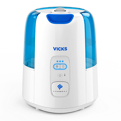 White Vicks Dual Comfort humidifier with translucent blue tank, dual top outlets and a front button control panel with cool and warm indicators.