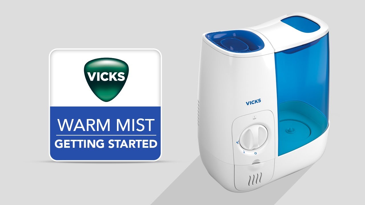 Vicks VWM845 warm-mist humidifier shown beside the branded Warm Mist Getting Started panel in a Vicks model-specific video thumbnail
