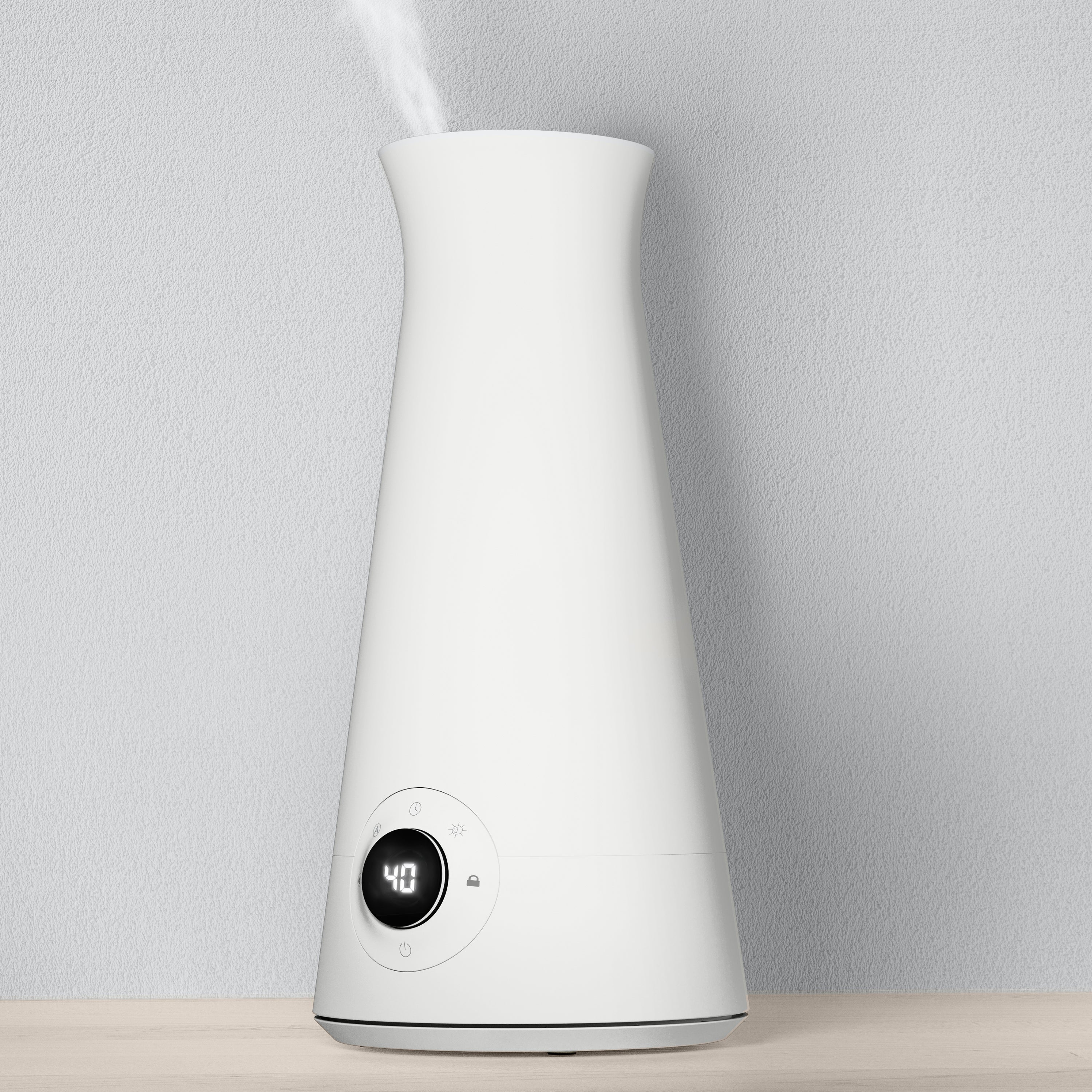 White Vornado Cira 4 humidifier with a round front display and visible mist plume